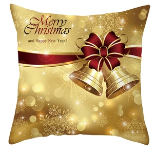 Christmas pillow cover with golden bells and red bow on snowflake background