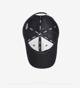 Detailed inner view of black baseball cap featuring FBXS reinforced lining and vent holes