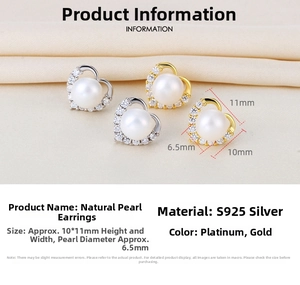 Detail of S925 silver heart stud earrings with natural pearls and pavé diamonds