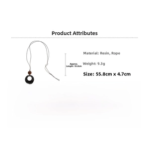 Detail view of resin round pendant necklace with dimensions 55.8cm and 9.3g weight