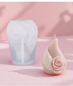Macro view of rose wing silicone mold and finished pink drop shaped scented candle