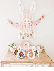 Detail of Easter bunny candy boxes with bow ties and clear windows for gifts
