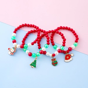 Kids Christmas beaded bracelets set with snowman, tree and bell charms on colorful pearls