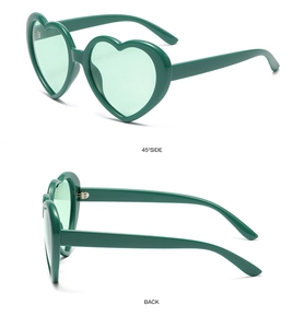 Detail view showing 45-degree side and back of dark green heart-shaped sunglasses