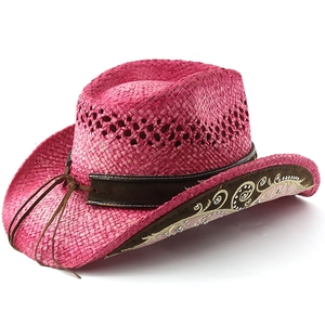 Detail of rose red western cowboy hat with embroidery, sequins and brown suede band