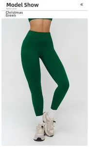 Detail view of high-waisted Christmas green yoga leggings with matte finish and seamless design