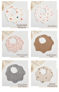 Detailed close-up of six-layer cotton gauze baby bibs in various floral and heart patterns
