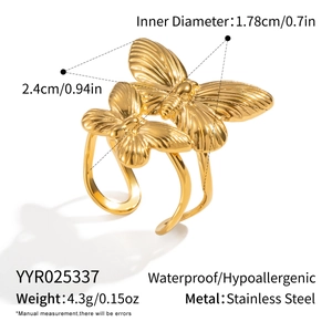 Detailed view of 18K gold butterfly double ring with 1.78cm inner diameter in stainless steel