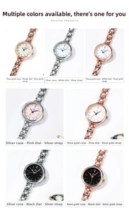 Detail view of various quartz watches with slim metal chain bracelets in rose gold and silver