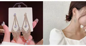 Detailed view of 925 silver fringe earrings with tassel design and cubic zirconia
