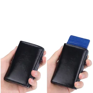 Black leather RFID blocking wallet with automatic pop-up aluminum card holder mechanism
