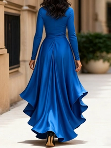 Rear view of an elegant royal blue long-sleeve maxi dress with silky satin finish