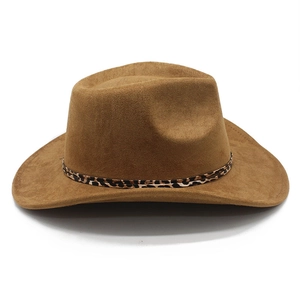 Detail of dark brown suede cowboy hat featuring a stylish leopard print decorative band