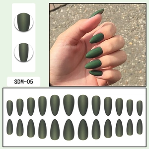 Detail of matte dark green almond-shaped press-on nails with 24 pieces display