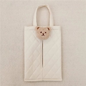Car seat back tissue box holder in beige quilted leather with cute plush bear detail