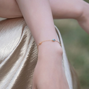 S925 sterling silver gold bracelet with oval blue topaz and golden star pendant