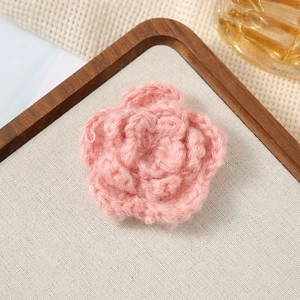 Detail of pink 7cm triple-layer handmade crochet flower for hair accessories and garments