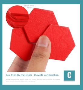Detail showing red hexagonal wooden puzzle pieces with a thickness of 4mm and natural grain