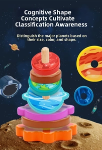 Macro detail of wooden solar system stacking rings with planetary theme and star motifs