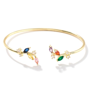 Gold willow branch open bangle set with multicolored marquise gems and white diamonds