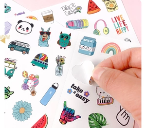 Detailed view of assorted cartoon animal stickers showing easy-peel adhesive feature