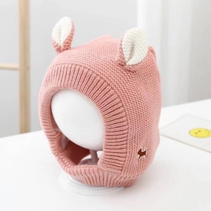 Pink knitted baby winter hat with cute animal ears and soft windproof earflaps