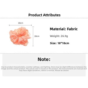 Detailed size chart of orange fabric scrunchie with 18x18cm dimensions and 26.9g weight