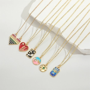 Detailed display of six gold alloy necklaces with colorful ocean star themed pendants