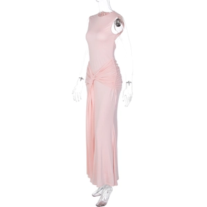 Detailed close-up of pink sleeveless maxi dress with twisted waist knot and ruched design