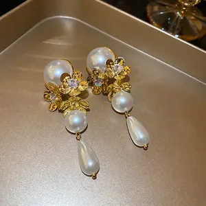 Elegant floral pearl earrings with zircon tassels in gold vintage style for women