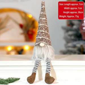 Detailed view of handmade Christmas gnome ornament with dimensions 7x7x38cm on white table