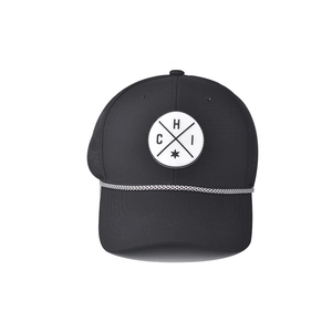 Detail of black trucker hat with round embroidered logo patch and woven cord detail