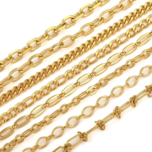Macro shot of assorted golden stainless steel Figaro and Cuban link chain styles for DIY