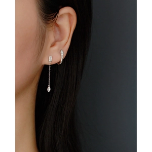 Detail of silver S925 snake stud and long fringe chain earring with teardrop pendant