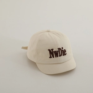 Close-up of high-density twill cotton fabric and 3D NwDie embroidery on toddler cap