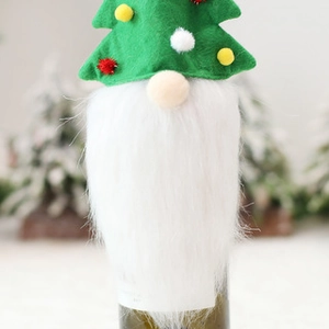 Christmas gnome wine bottle cover with green felt hat, pom poms and long white beard