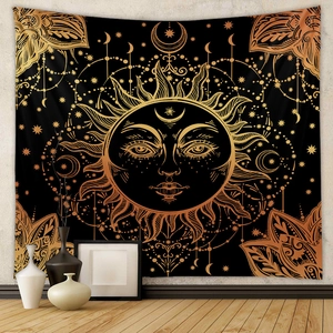 Bohemian sun and moon tapestry in black and gold for mystical wall decoration