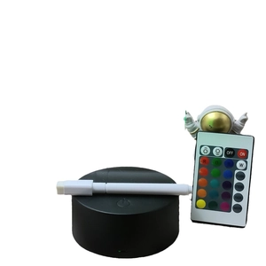 DIY acrylic night light kit with black base, remote control, white pen and astronaut toy