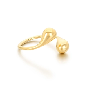 Polished gold stainless steel open teardrop ring with diamond inlay on white background