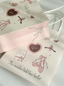 Detail showing the Ballet Girl aesthetic kraft paper gift bag with pink ballet shoes pattern