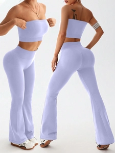 Two-piece lavender seamless yoga set with cropped tube top and high waist flare leggings