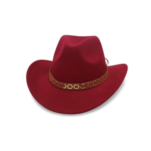 Detail view of a dark red wool felt cowboy hat with gold hexagonal metal accents