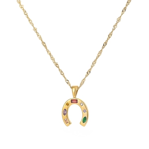 Golden horseshoe pendant necklace with colorful zircon gemstones on a classic gold chain