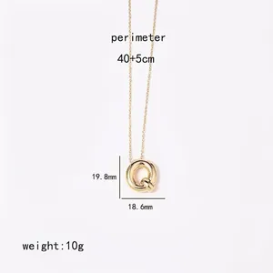 Detailed view of the gold alphabet necklace showing 40+5cm length and 19.8mm pendant size