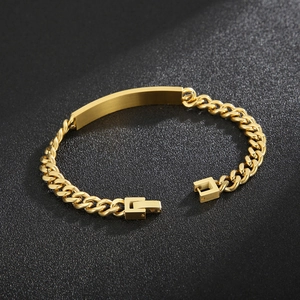 Detail of 7mm gold stainless steel Cuban chain with roman numeral plaque and clasp
