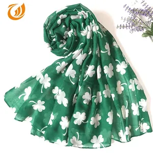 Green St. Patrick's Day scarf with white clover print and soft voile fabric