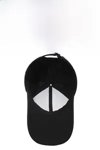 Detail view of the breathable mesh lining and adjustable strap on a black baseball cap