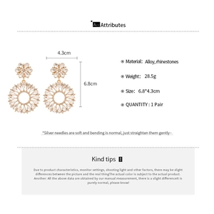Detailed view of luxury gold tassel earrings with rhinestones showing 6.8x4.3cm dimensions