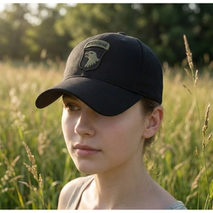 Detailed view of military style cotton baseball cap with Airborne embroidery and eagle patch