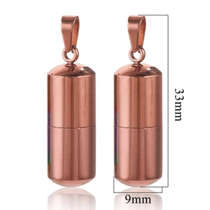 Macro detail of rose gold pill pendant with dimensions 33mm height and 9mm width